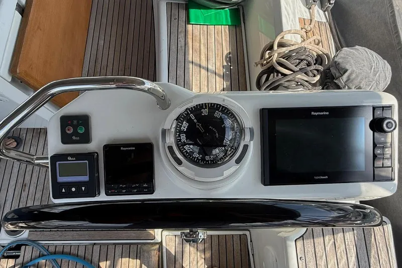 Slide: The Image of Cockpit of 2018 Jeanneau 51 yacht with navigation instruments and compass. - 21
