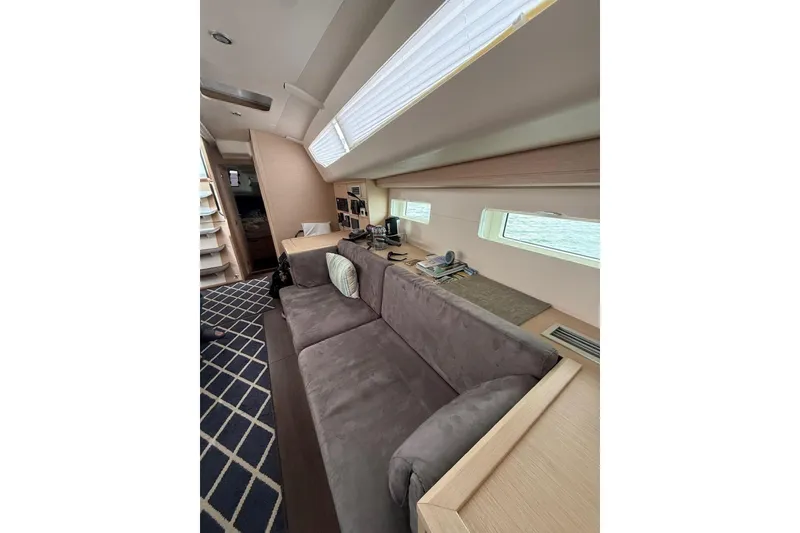 Slide: The Image of Luxurious interior of 2018 Jeanneau 51 yacht with plush seating and modern design. - 23