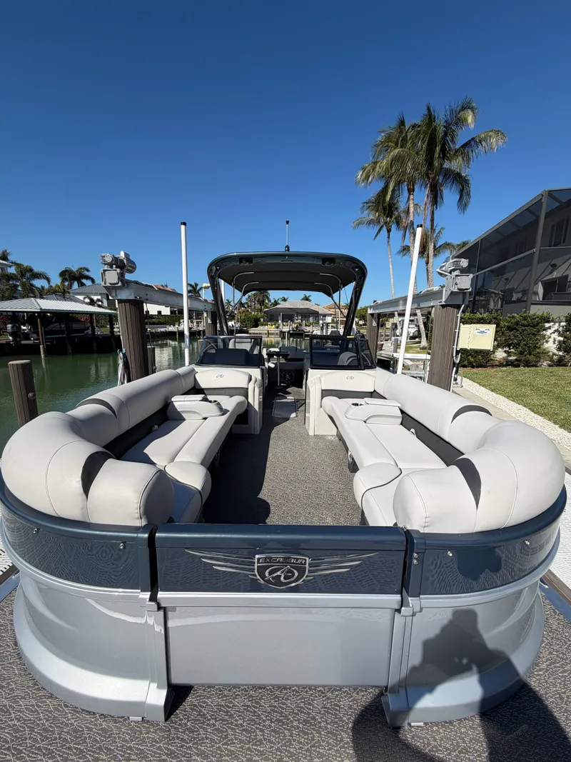 Slide: The Image of 2021 Avalon Excalibur Twin Elite Pontoon with luxurious interior. - 11