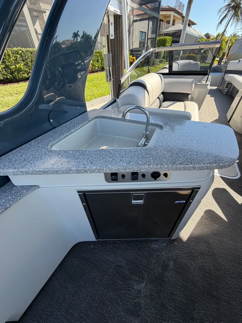 Slide: The Image of Luxury kitchenette on Avalon Excalibur Twin Elite Pontoon 2021. - 7