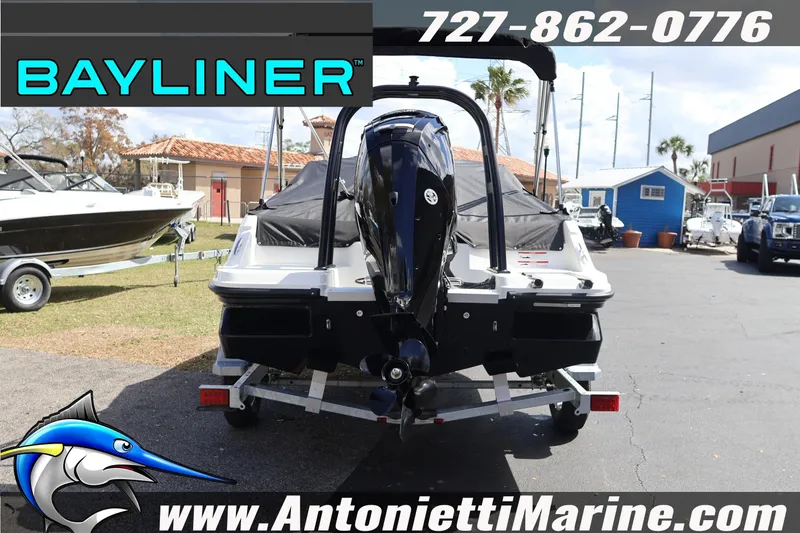 Slide: The Image of 2026 Bayliner Element M17 boat on trailer at Antonietti Marine dealership. - 4