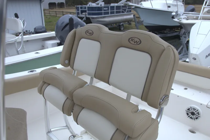 Slide: The Image of 2020 Key West 239 FS boat with tan and white cushioned seating. - 13