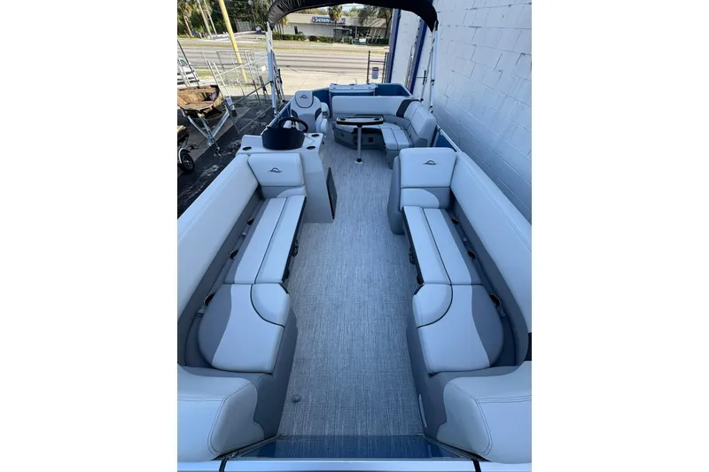 Slide: The Image of 2026 SunCatcher Select 22RF pontoon boat interior with spacious seating and modern design. - 12