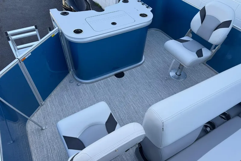 Slide: The Image of Interior of 2026 SunCatcher Select 22RF pontoon boat with seating and helm station. - 14