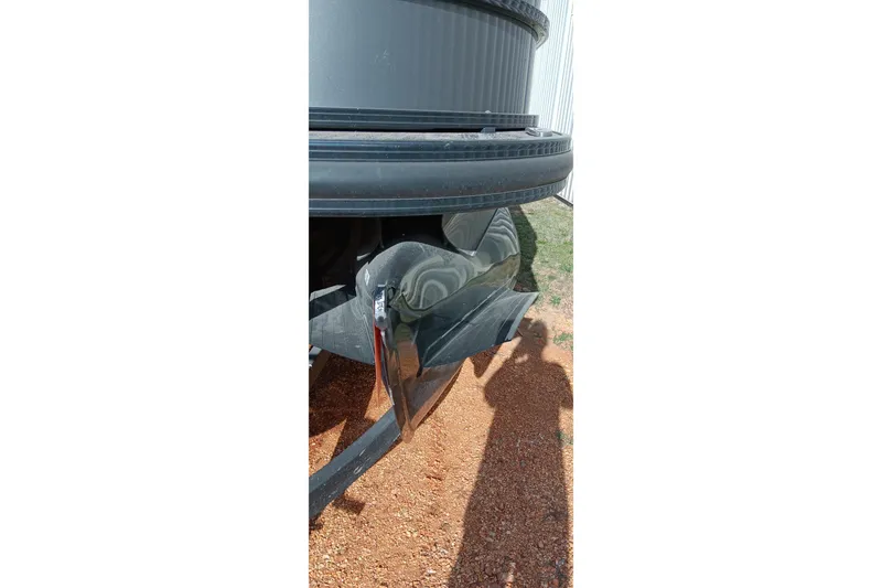 Slide: The Image of Damaged rear bumper of a 2023 Ranger 2500LS vehicle on gravel surface. - 14