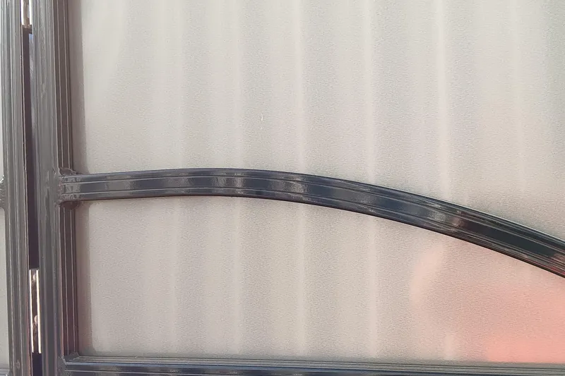 Slide: The Image of Close-up of a 2023 Ranger 2500LS boat's sleek metallic frame design. - 17