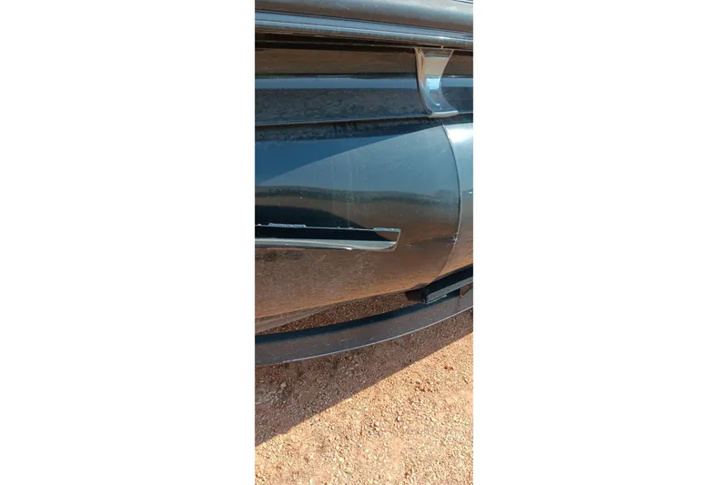 Slide: The Image of 2023 Ranger 2500LS boat side view on sandy terrain. - 19