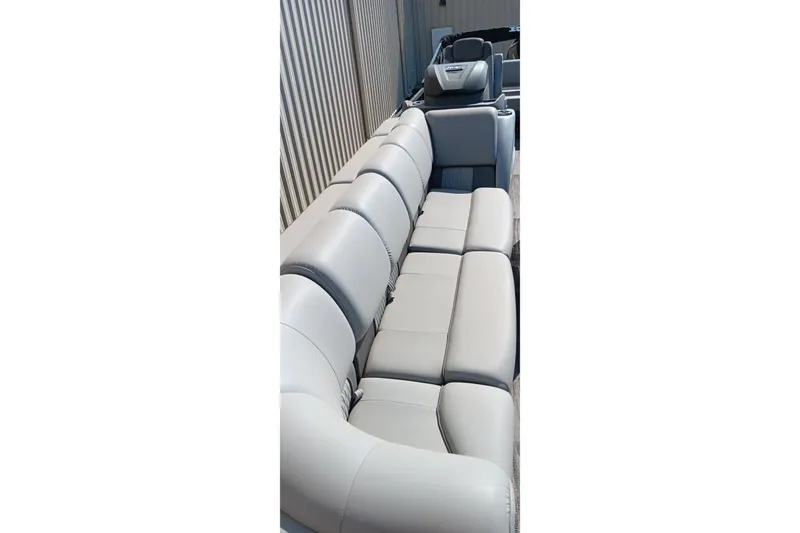 Slide: The Image of 2023 Ranger 2500LS boat interior with sleek, comfortable seating. - 25