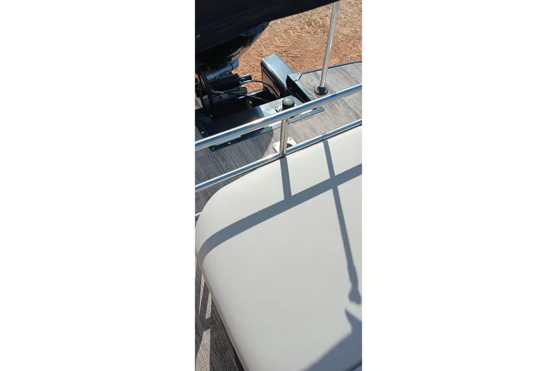 Slide: The Image of 2023 Ranger 2500LS boat interior with seating and railing details. - 33