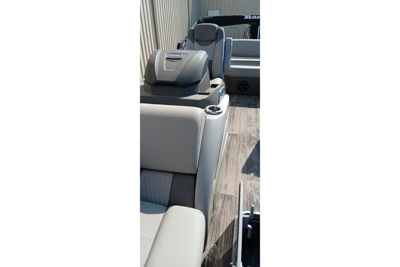 Slide: The Image of 2023 Ranger 2500LS boat interior with gray seating and modern design. - 38