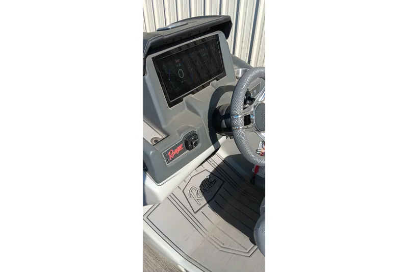 Slide: The Image of Dashboard of 2023 Ranger 2500LS boat with steering wheel and control panel. - 40