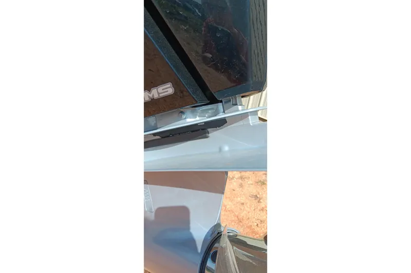 Slide: The Image of Close-up of a 2023 Ranger 2500LS boat motor and propeller in sunlight. - 43