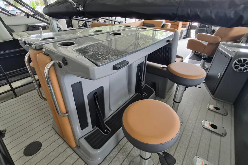 Slide: The Image of 2026 Sylvan L3 DLZ Bar interior with bar stools and sleek design. - 12