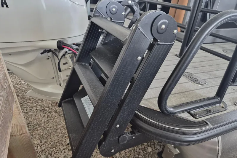 Slide: The Image of 2026 Sylvan L3 DLZ Bar boat ladder and deck, featuring sturdy construction. - 18