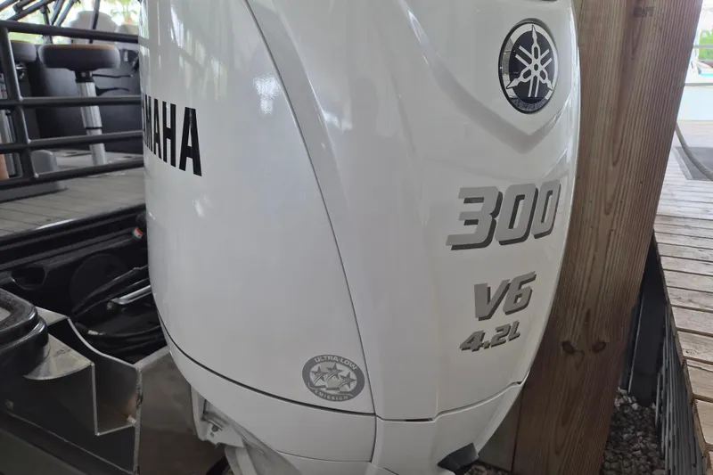 Slide: The Image of Yamaha 300 V6 4.2L outboard engine on a 2026 Sylvan L3 DLZ Bar boat. - 19