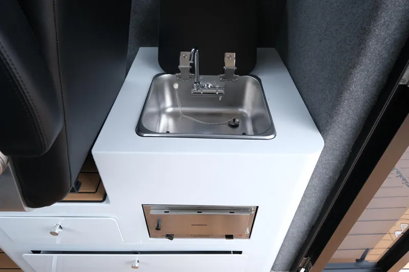 Slide: The Image of Compact stainless steel sink in 2026 Makaira 28 interior, featuring modern design and functionality. - 20
