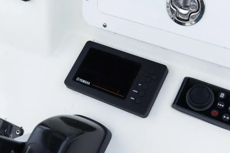 Slide: The Image of Yamaha control panel on 2018 May-Craft 23 Cape Classic boat dashboard. - 15