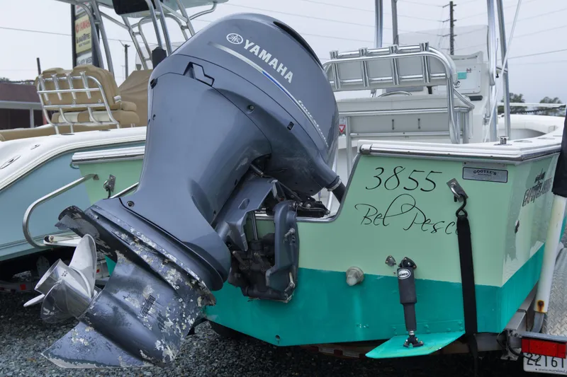 Slide: The Image of 2018 May-Craft 23 Cape Classic boat with Yamaha outboard motor, docked on trailer. - 4