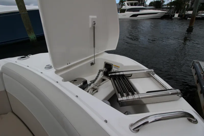 Slide: The Image of 2023 Boston Whaler 240 Vantage helm with modern controls and comfortable seating. - 24