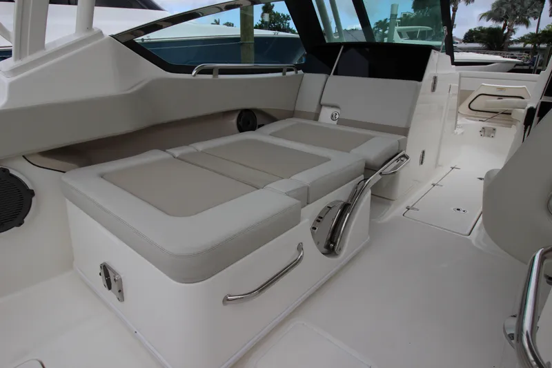 Slide: The Image of 2023 Boston Whaler 240 Vantage helm with steering wheel and navigation system. - 34