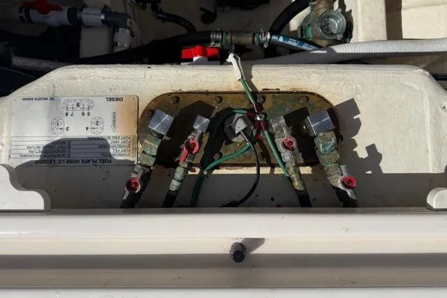 Slide: The Image of Electrical connections in a 2010 Tiara Yachts 3900 Open boat engine compartment. - 20