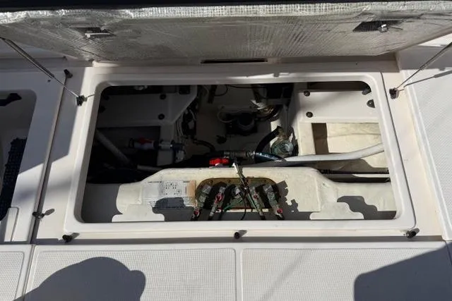 Slide: The Image of Engine compartment of a 2010 Tiara Yachts 3900 Open, showcasing internal components. - 21