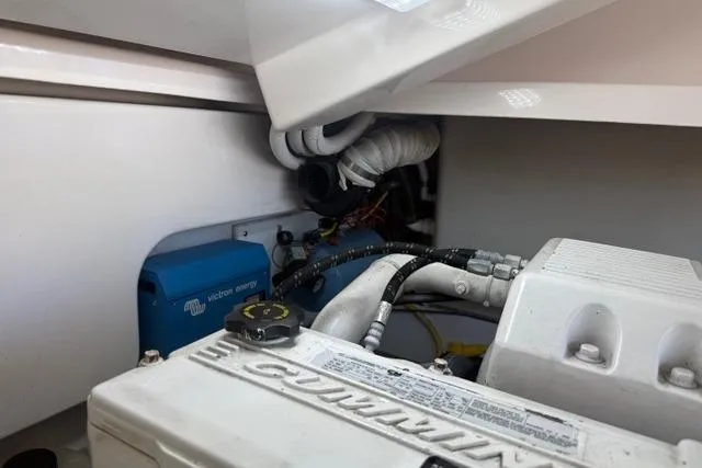 Slide: The Image of Engine compartment of a 2010 Tiara Yachts 3900 Open with visible components. - 38