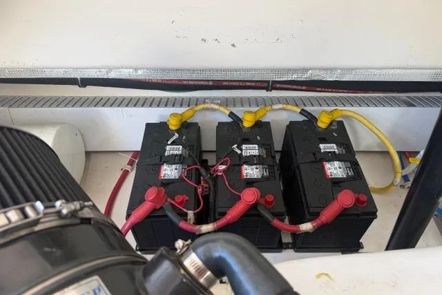 Slide: The Image of Battery setup in a 2010 Tiara Yachts 3900 Open engine compartment. - 42