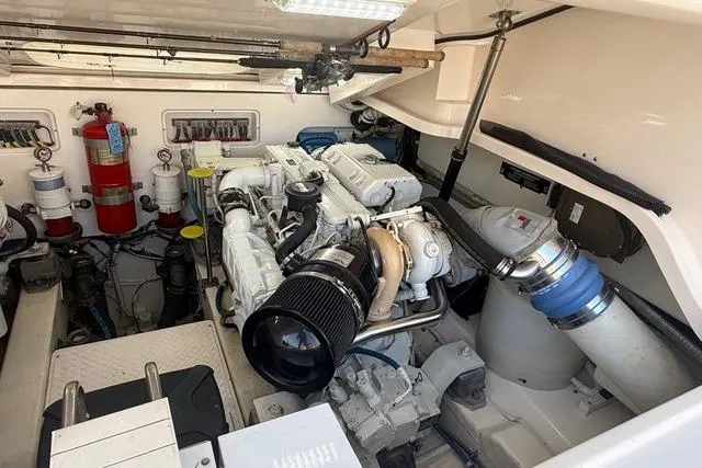 Slide: The Image of Engine room of a 2010 Tiara Yachts 3900 Open, showcasing mechanical components. - 46