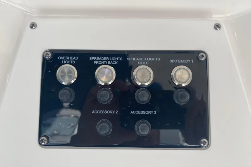 Slide: The Image of Control panel of 2026 Sea Fox 268 Commander boat with labeled switches. - 10