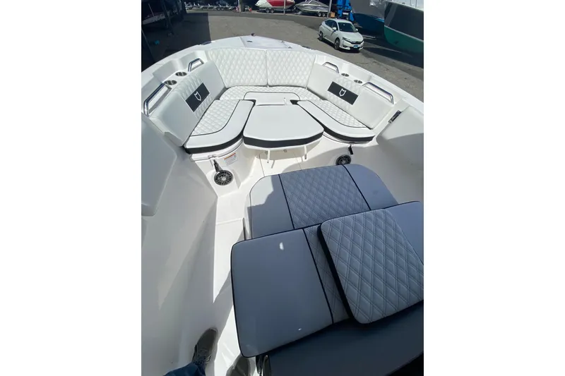 Slide: The Image of 2026 Sea Fox 268 Commander boat interior with cushioned seating and modern design. - 14