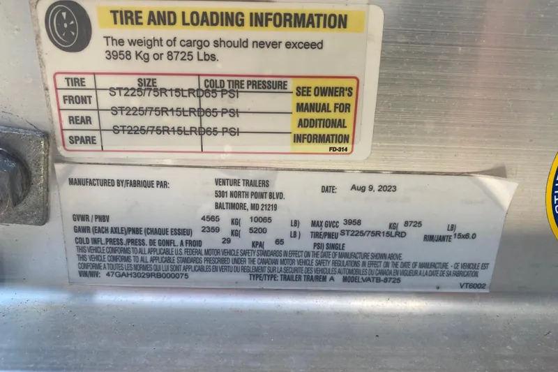Slide: The Image of Tire and loading information label on a 2026 Sea Fox 268 Commander. - 30