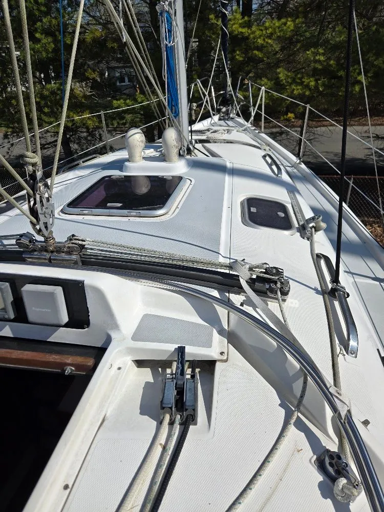 Slide: The Image of Deck of a 1995 Hunter 336 sailboat with rigging. - 2
