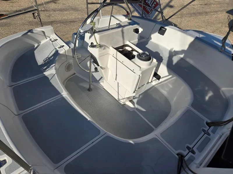 Slide: The Image of Interior of a 1995 Hunter 336 sailboat with steering wheel. - 25