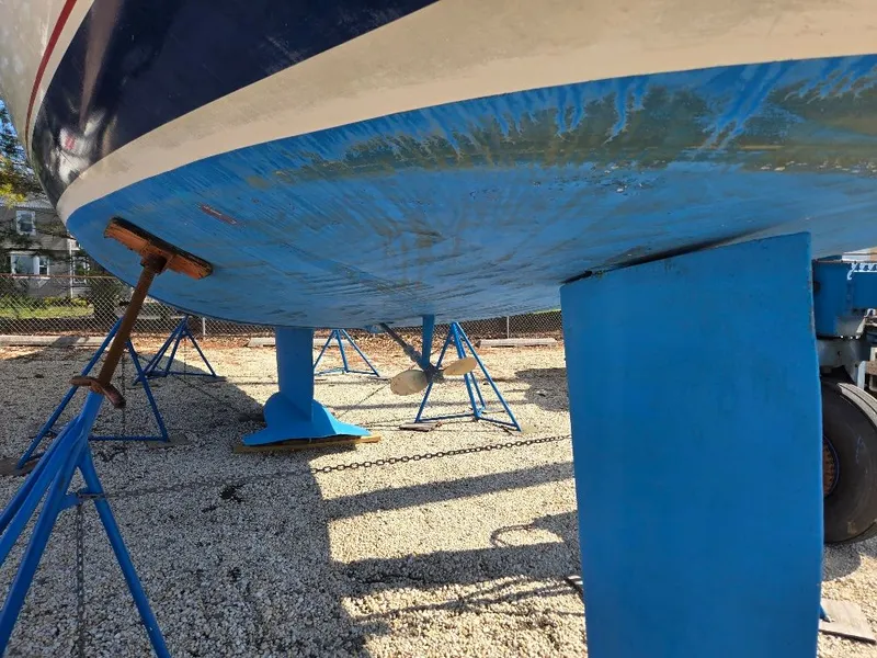 Slide: The Image of Underside of a 1995 Hunter 336 sailboat on stands. - 3