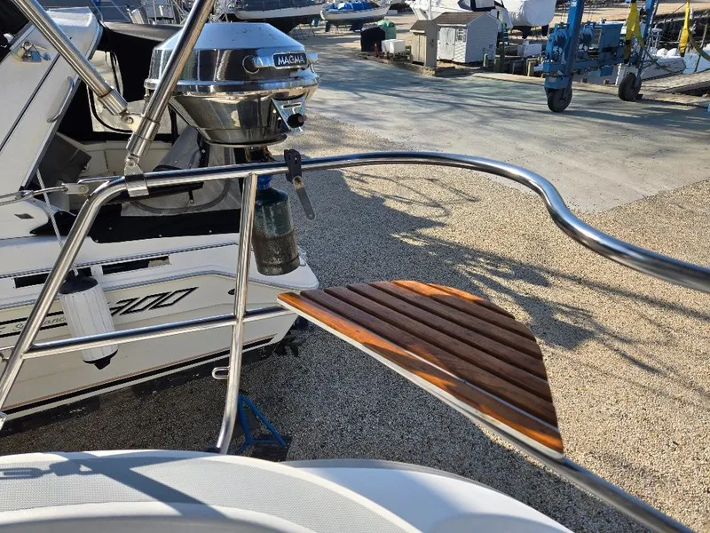 Slide: The Image of 1995 Hunter 336 sailboat with stainless steel grill and wooden platform. - 33