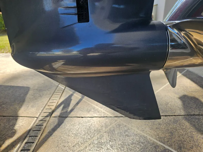 Slide: The Image of Close-up of a 2012 Godfrey Hurricane 217 Sundeck propeller. - 14