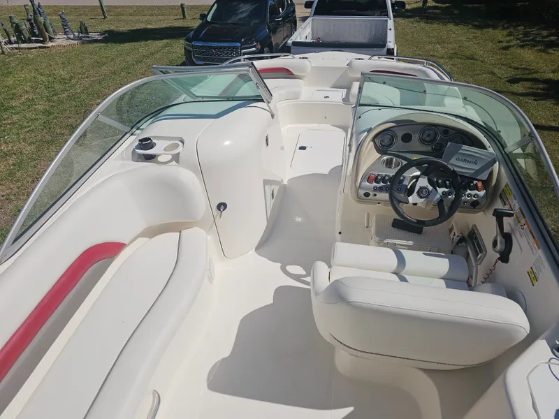 Slide: The Image of Interior of a 2012 Godfrey Hurricane 217 Sundeck boat. - 2