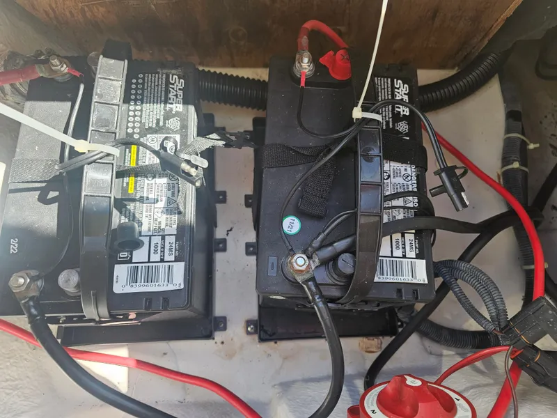 Slide: The Image of Batteries in a 2012 Godfrey Hurricane 217 Sundeck boat. - 21