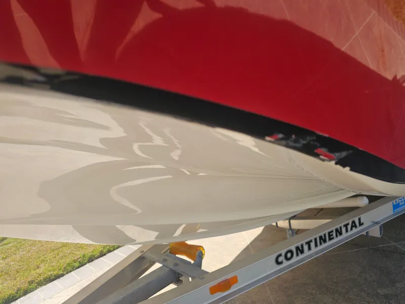 Slide: The Image of Red 2012 Godfrey Hurricane 217 Sundeck on Continental trailer. - 25