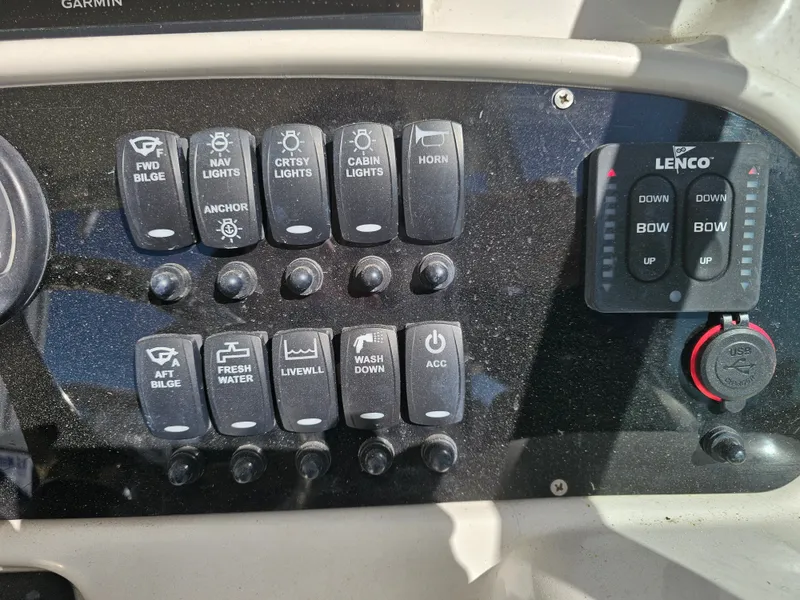 Slide: The Image of Control panel of a 2006 Robalo R265 Walkaround boat. - 19