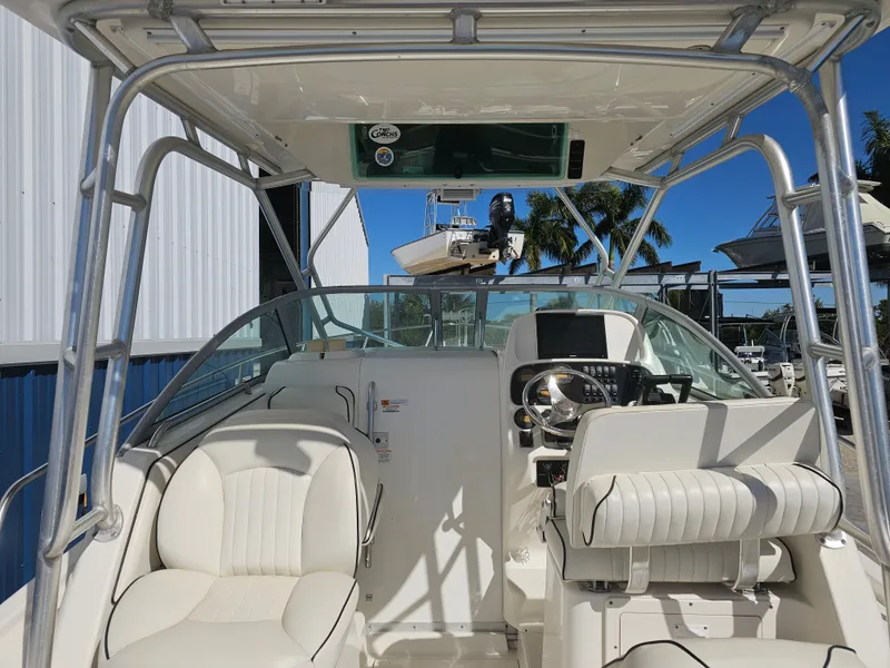 Slide: The Image of Interior view of a 2006 Robalo R265 Walkaround boat. - 3