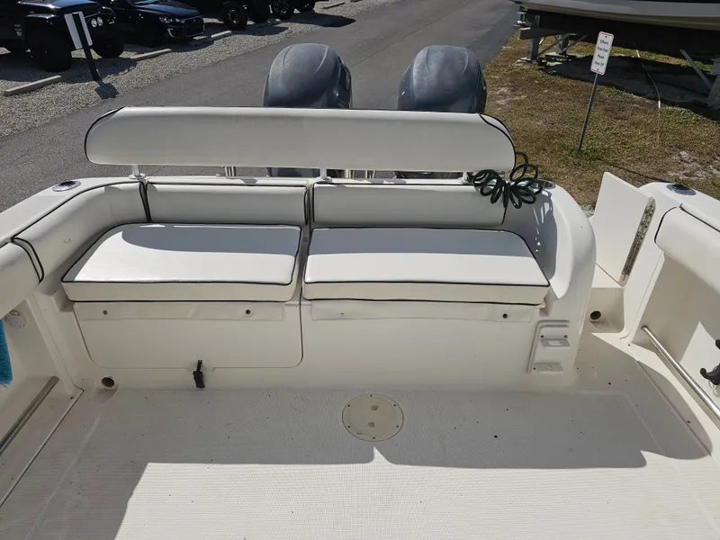Slide: The Image of Robalo R265 Walkaround 2006 boat seating and engines. - 30