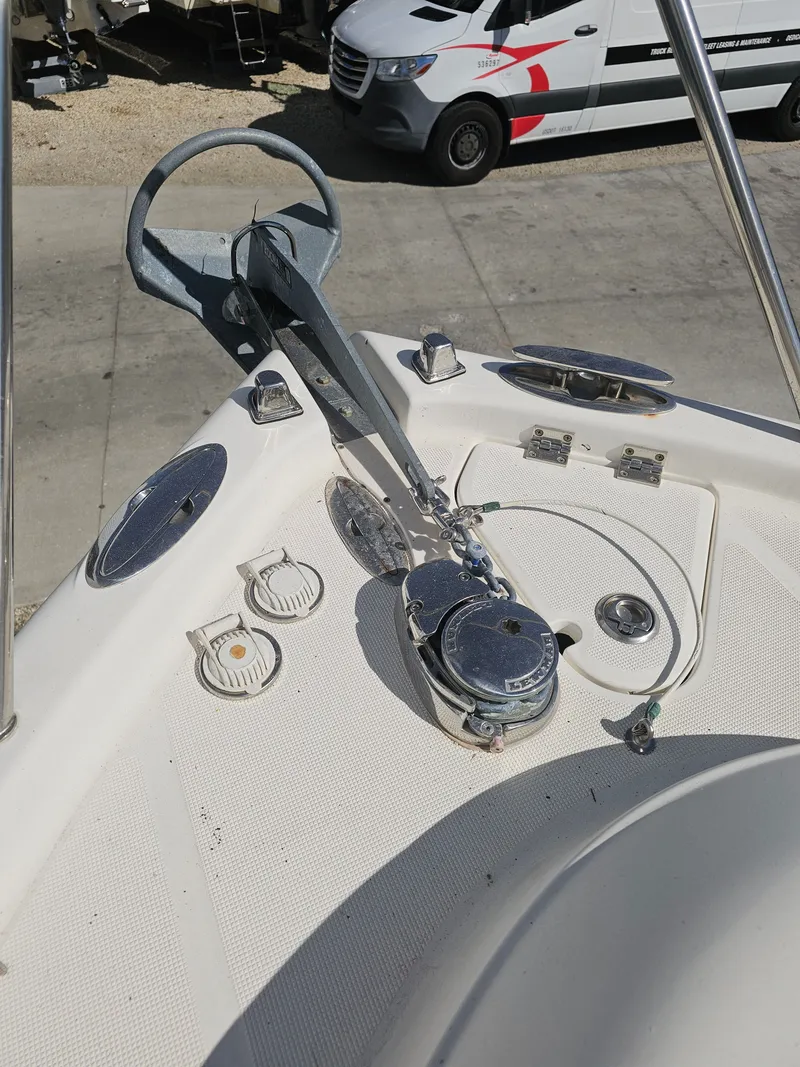 Slide: The Image of 2006 Robalo R265 Walkaround anchor area with windlass. - 33