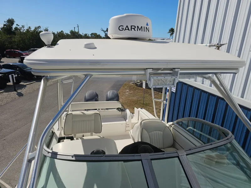 Slide: The Image of 2006 Robalo R265 Walkaround with Garmin equipment, side view. - 38