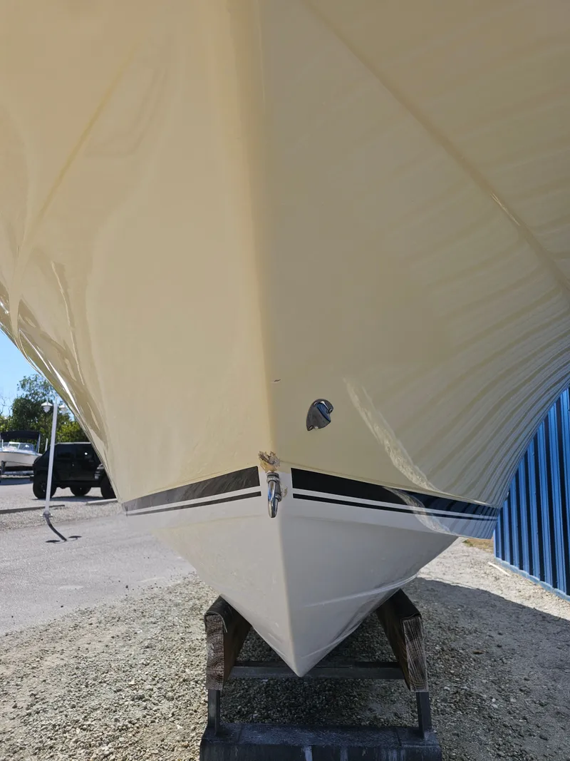 Slide: The Image of 2006 Robalo R265 Walkaround boat hull on stand. - 45