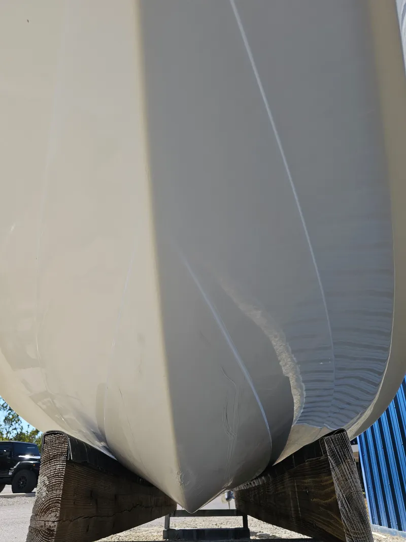 Slide: The Image of Close-up of the hull of a 2006 Robalo R265 Walkaround boat. - 46