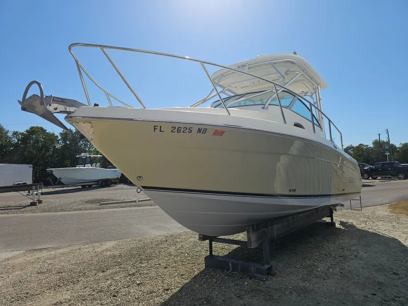 Slide: The Image of 2006 Robalo R265 Walkaround boat on a trailer. - 47