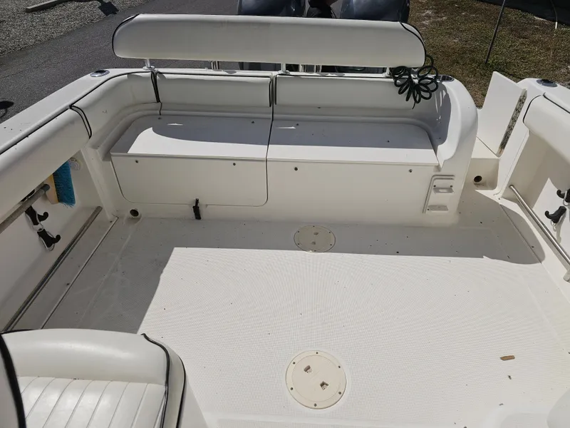 Slide: The Image of Interior of a 2006 Robalo R265 Walkaround boat, clean and spacious. - 8
