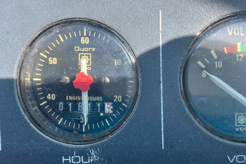 Slide: The Image of Close-up of Tiara Yachts 3100 Open 1991 engine hour gauge showing 1811.5 hours. - 21